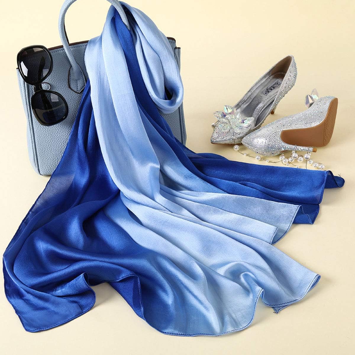 K-Elewon long lightweight shawl draped on model