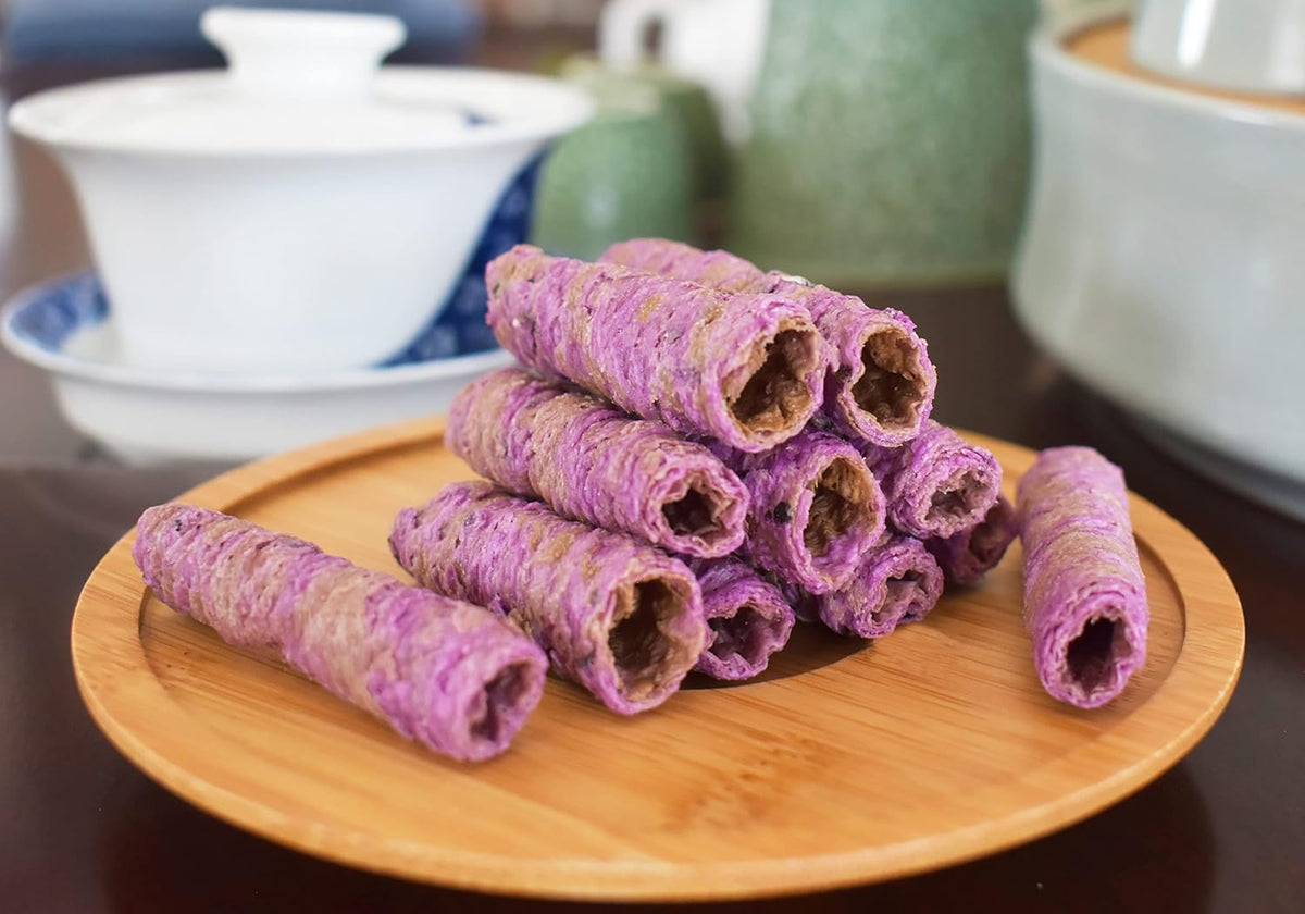 Two packs of Aroi Coconut Crispy Rolls 80g packaging