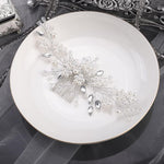 Jumwrit silver bridal headpiece displayed on a neutral background