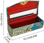 Assorted brocade pattern lipstick cases arranged together