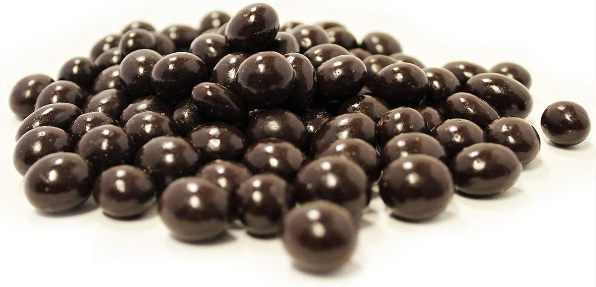Close up of vegan sugar free chocolate coated coffee beans