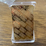 LRGKMCWTOB glittering gold bullion replica angled view