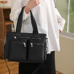 Alusbell nylon crossbody bag showing multiple pockets