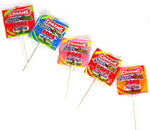 Individually wrapped Charms flat lollipops showcasing the split personality sweet and sour halves.