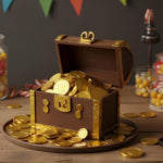 By The Cup gold chocolate coins handled to showcase individual coin sizing