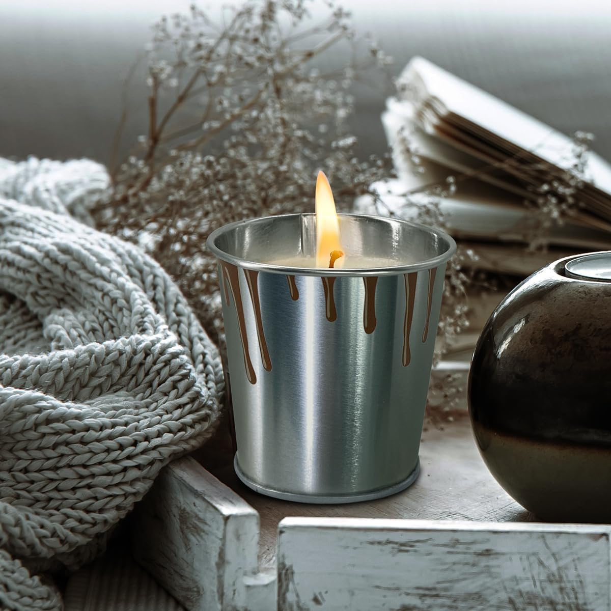 Jeximing soy wax candles displayed on an outdoor patio table