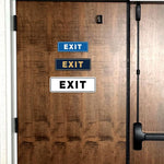 All Quality exit sign displayed with double-sided foam adhesive tape