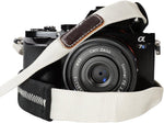 Foto&Tech strap attached to a mirrorless camera system