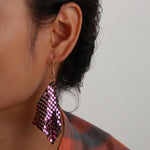 Allereyae purple long tassel drop earrings closeup angle