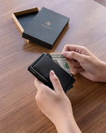 Vulkit RFID blocking wallet angled view showcasing metal and leather texture