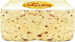 Assorted individually wrapped Italian nougat candies spread out on a table