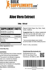 A spoonful of 100mg serving size aloe vera extract powder being mixed into a healthy green wellness smoothie.