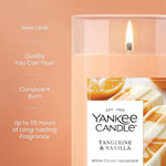 Yankee Candle scented pillar candle lit in a cozy room setting