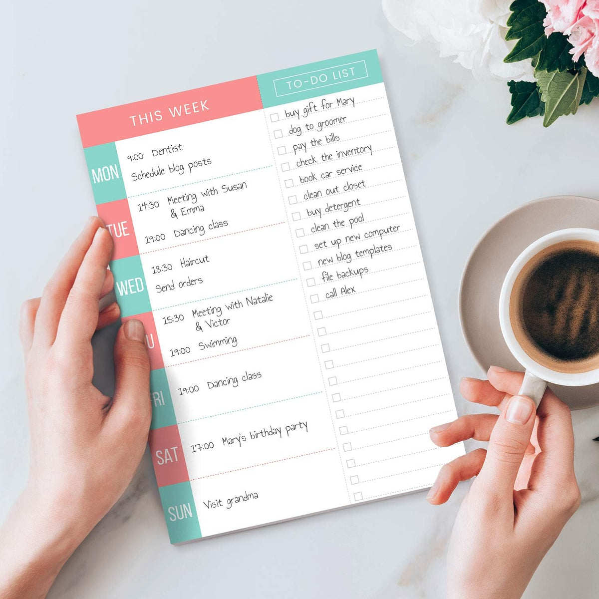 The magnetic backing of the weekly planner pad displayed flat.