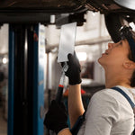 EupHHonycs mechanic mirror being used for vehicle inspection