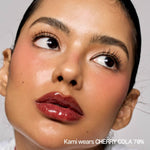 Fwee moisturizing gel formula lip makeup bottle with applicator wand displayed clearly.
