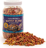 Fluker's turtle food pellets and freeze-dried insects floating on water surface for aquatic reptiles.
