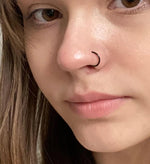 MODRSA fake nose ring on model face