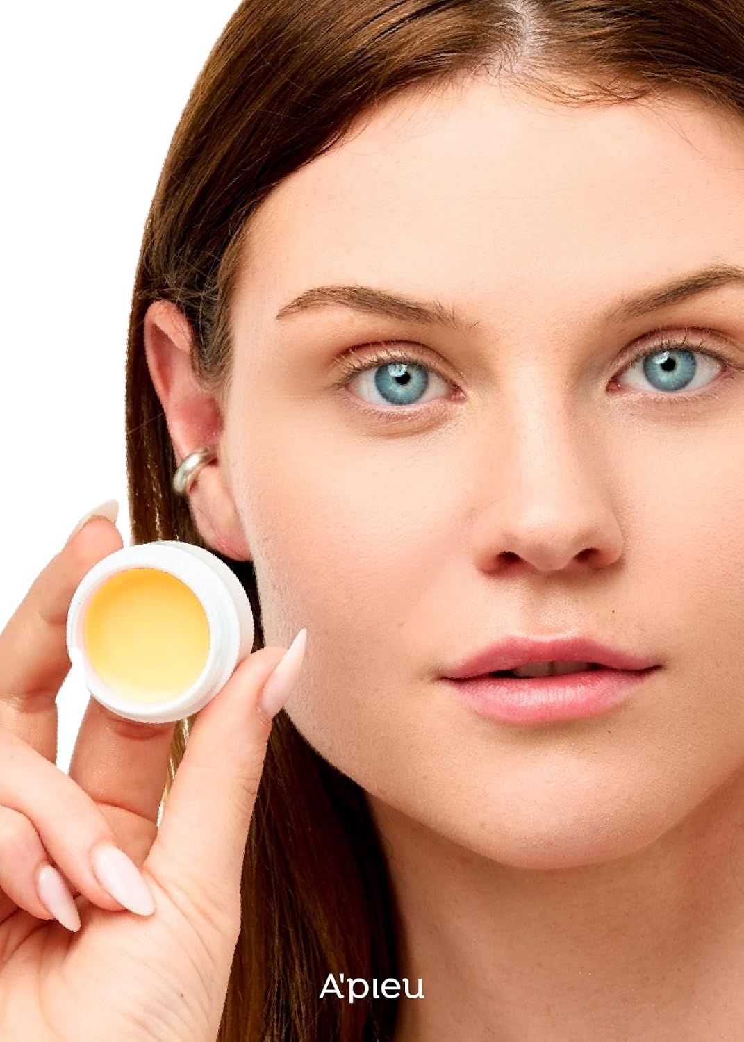 Application of A'Pieu lip oil on model lips
