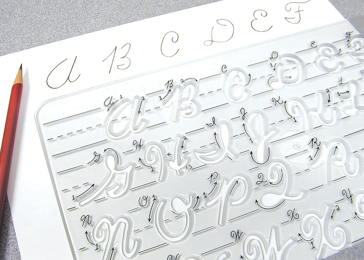 Close up view of alphabet letter cutouts and directional arrows on plastic stencil