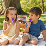 Fruidles handcrafted purple heart lollipops ideal for kids birthday parties.