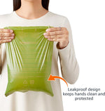 Close up of 13 by 9 inch green pet waste bag demonstrating generous hand coverage