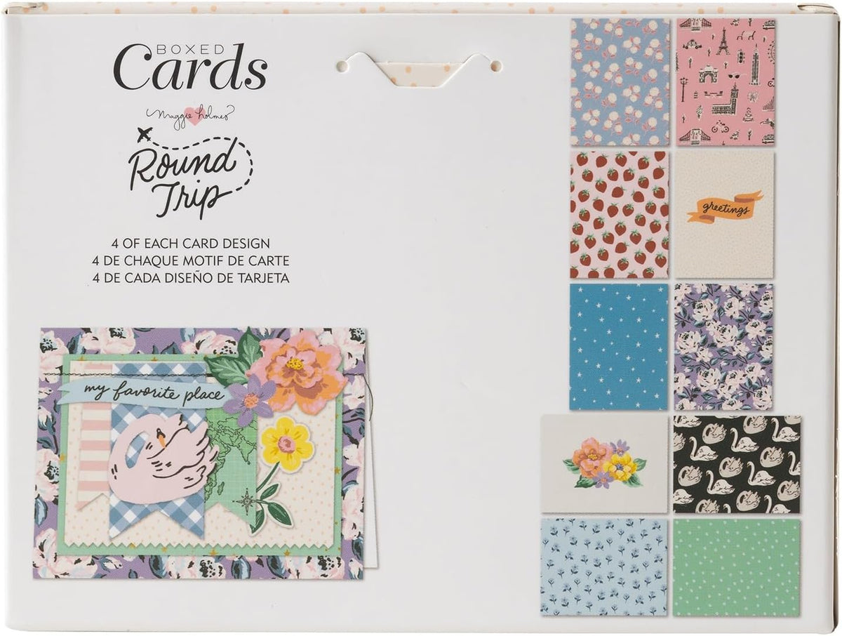 Close up of vintage floral patterned cards and matching envelopes