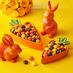 Authentic USA imported Zisbers peanut butter confections filled inside a clear glass party candy bowl.
