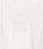 Small white disposable male dog diaper wrap spread out flat