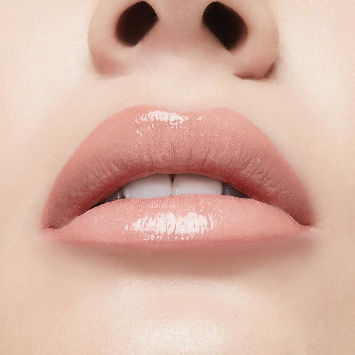 Milani cosmetics lip maximizing gloss container on a clean background