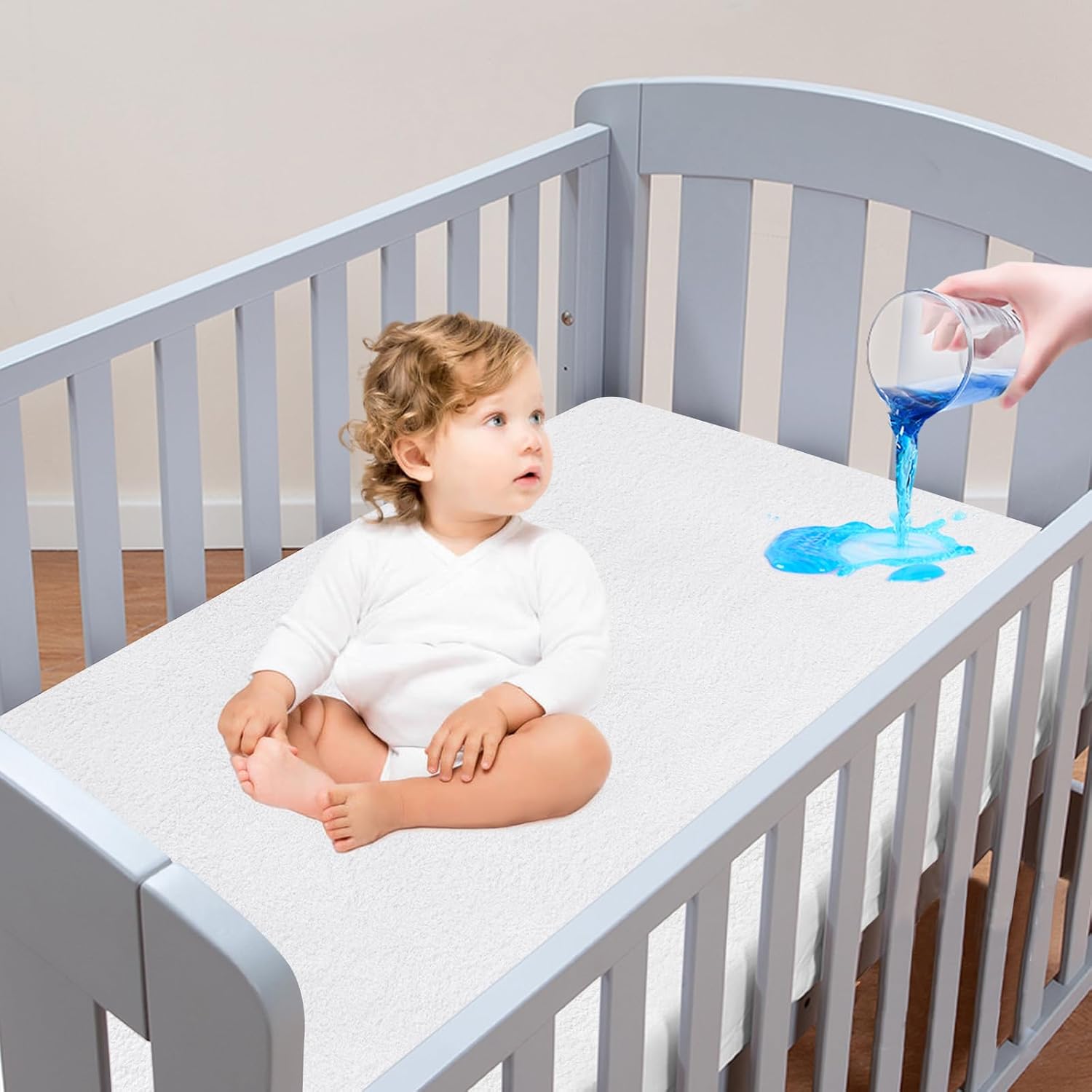 Moonsea Crib Mattress Protector front view showing white bamboo terry surface