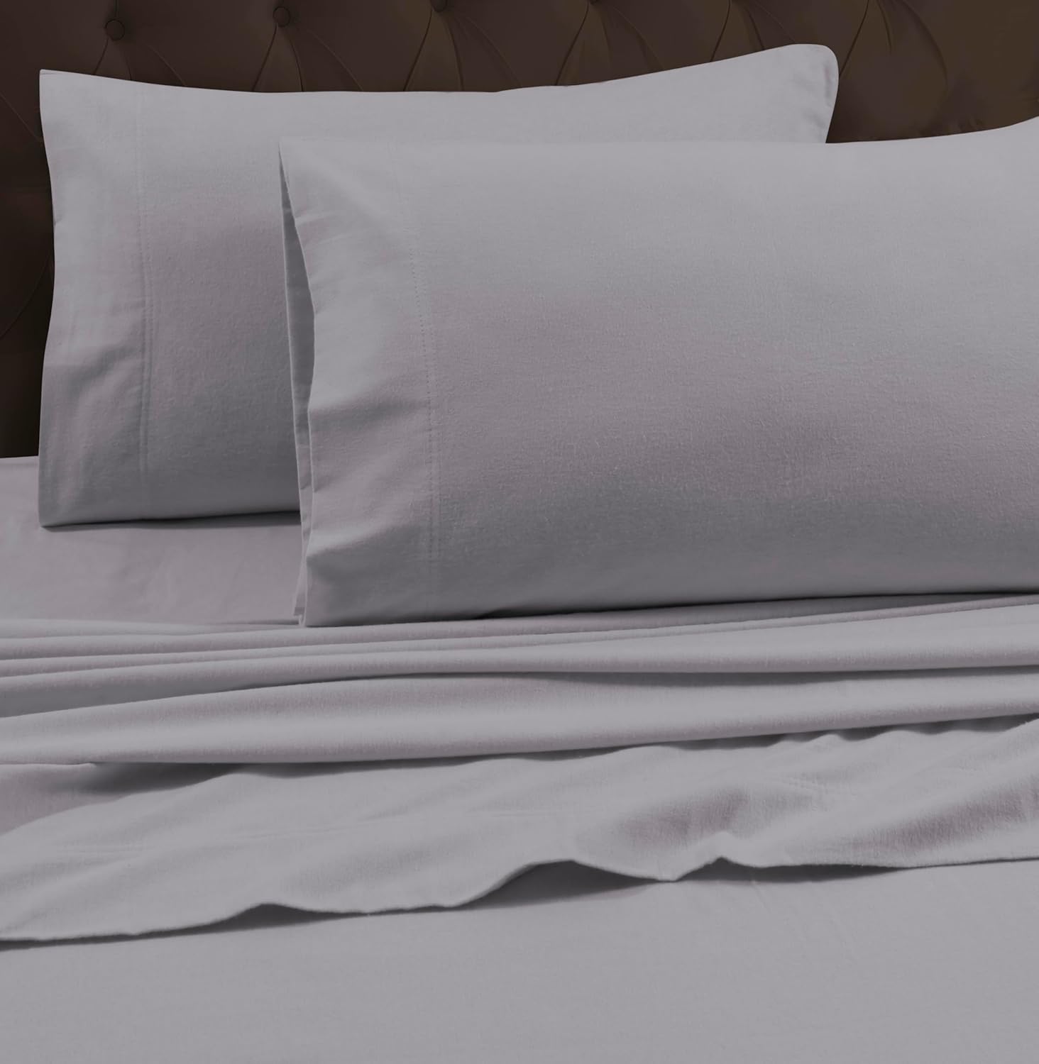 Tribeca Living King Cotton Flannel Flat Sheet in silver grey laid flat on a bed showcasing its brushed texture.