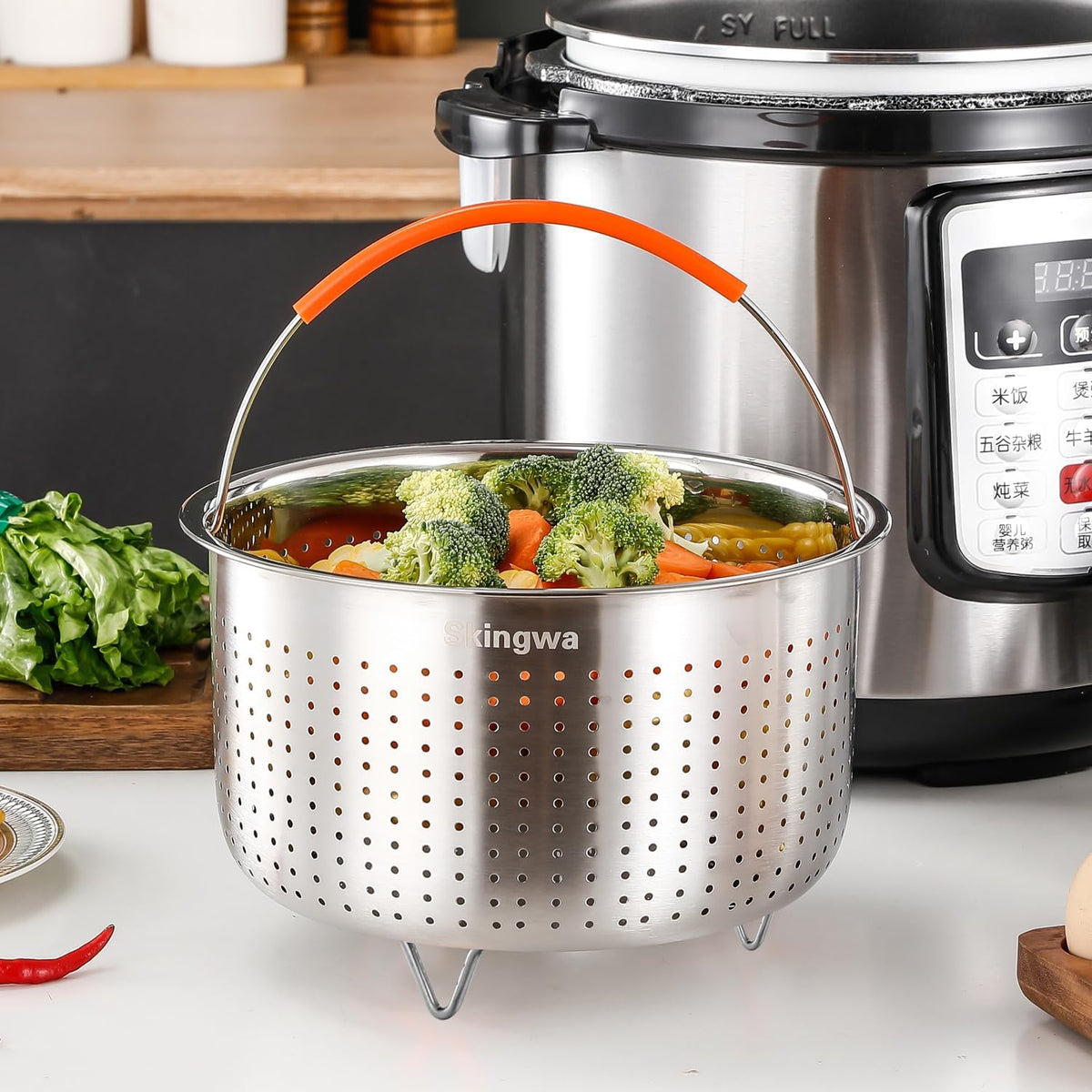 Skingwa pot steamer basket resting on elevated feet