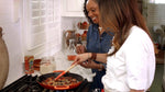 Le Creuset craft series spatula spoon resting on nonstick cookware