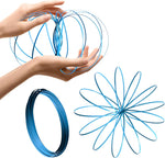 Zayin Glow in the Dark Magic Flow Ring kinetic spring toy front view showing the expanded 3D stainless steel bubble shape.