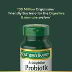 Side angle of Nature's Bounty daily probiotic bottle displaying the vegetarian supplement certification and details.
