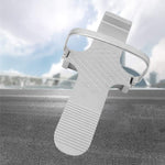 Oreilet alloy lifting tool positioned for ceramic tile installation.