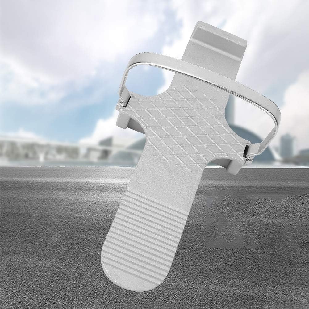 Oreilet alloy lifting tool positioned for ceramic tile installation.