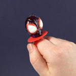 Close up of Spidey character shaped lollipop ring candy