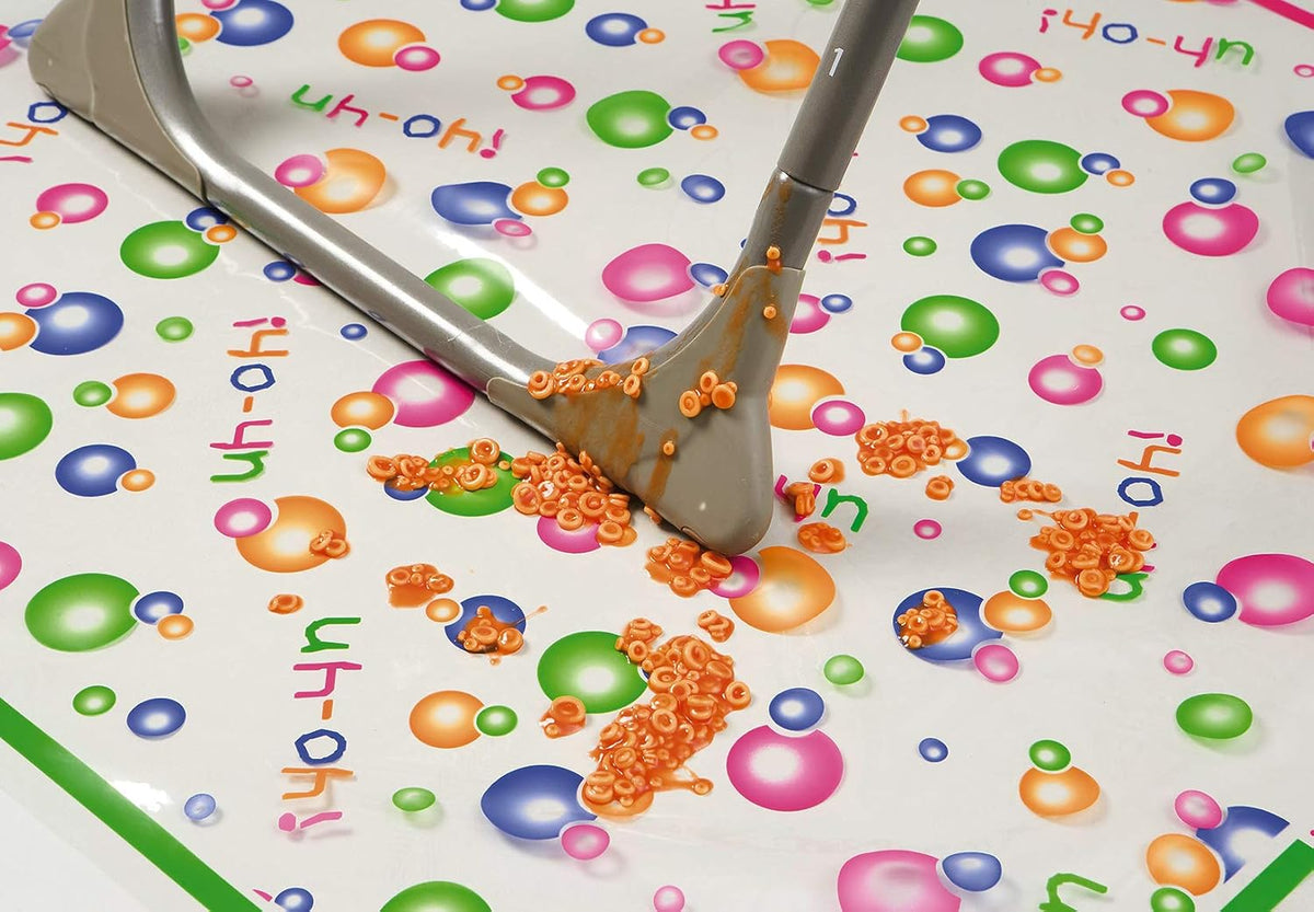 Mommy's Helper high chair mat folded for compact storage