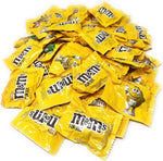 A heap of classic M&M'S milk chocolate packets showing the two-pound bulk quantity
