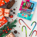 Vibrant blue red and green striped Christmas candy canes out of the box