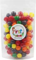 Assorted fruit sours chewy candy balls close up colorful mix