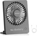 TriPole mini desk fan black front view on an office table setup
