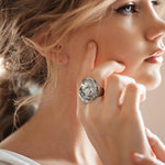 Aprilery cocktail ring side profile displaying polished metal thickness and curves