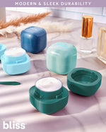 Bliss travel accessories showing portable refillable jars for creams and cosmetic storage