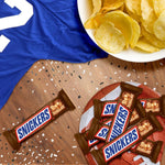 Snickers classic milk chocolate candy multipack on a plain background