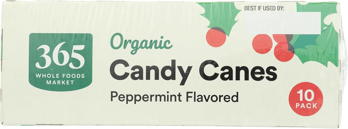 Festive organic candy canes by 365 brand placed on a Christmas tree