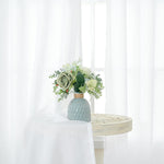 YoungsTex light filtering window treatment in living room