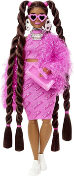 Close up of Barbie Extra doll brunette hair with pink ribbons and braids